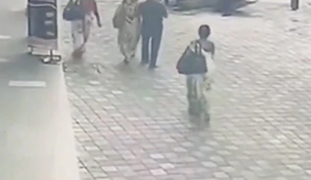 Moment woman falls into sinkhole when street collapsed and is still missing days later