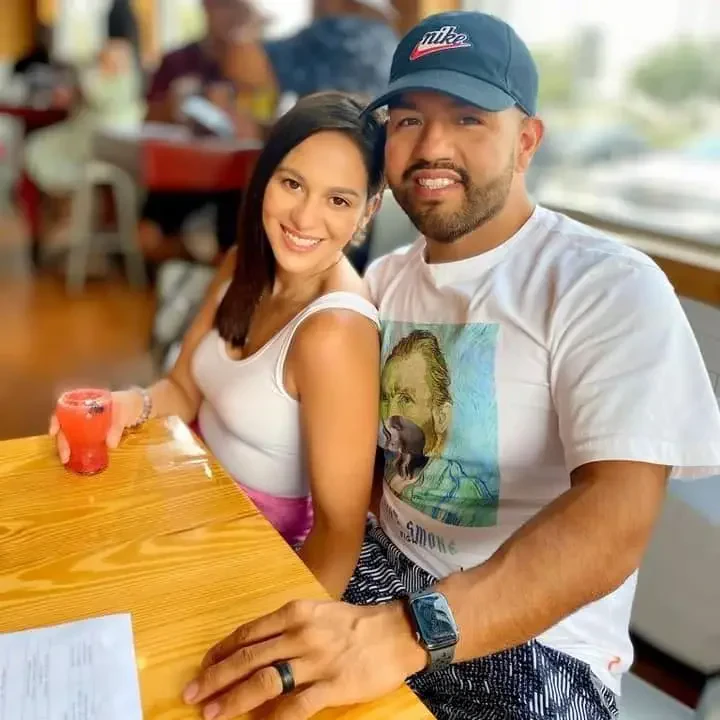 Adrian, with wife Regina Santos-Aviles, said that Rep. Tony Gonzales “abused his power. Credit: Facebook