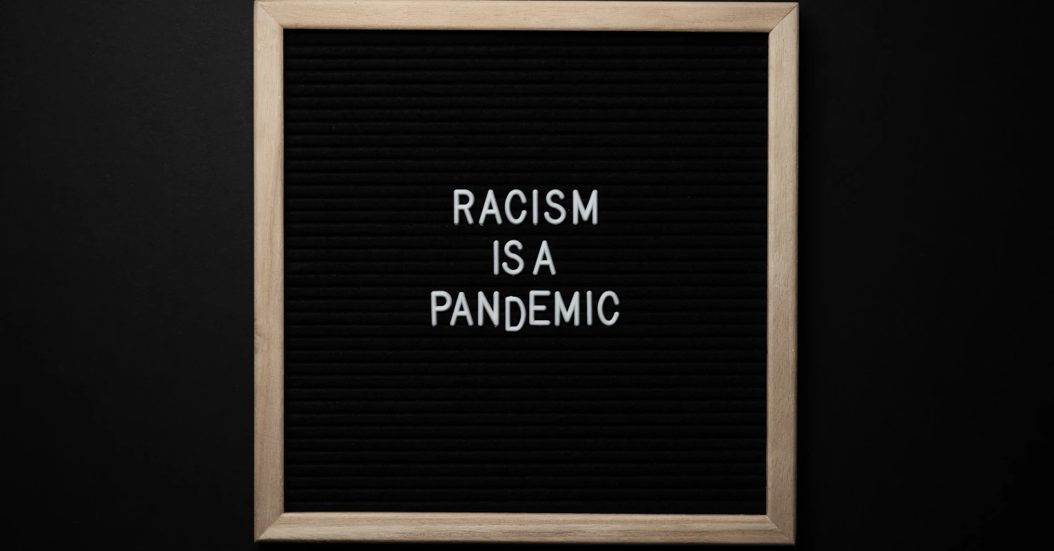 Woman holding taser and poodle tells black family to 'act more like white people'