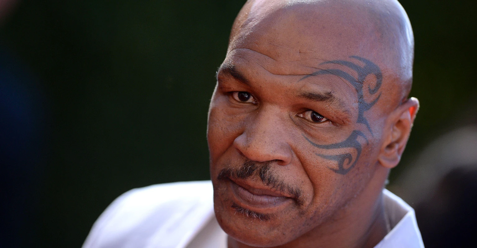 People are convinced 1995 Mike Tyson fight video shows 'time traveler' using a smart phone