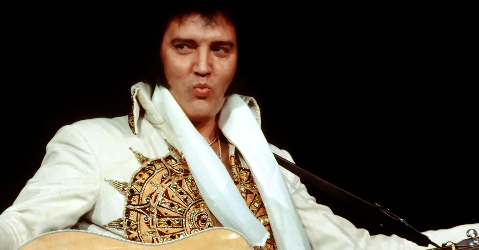 Conspiracy theorists think video of Elvis fan holding 'cell phone' is proof of time travel