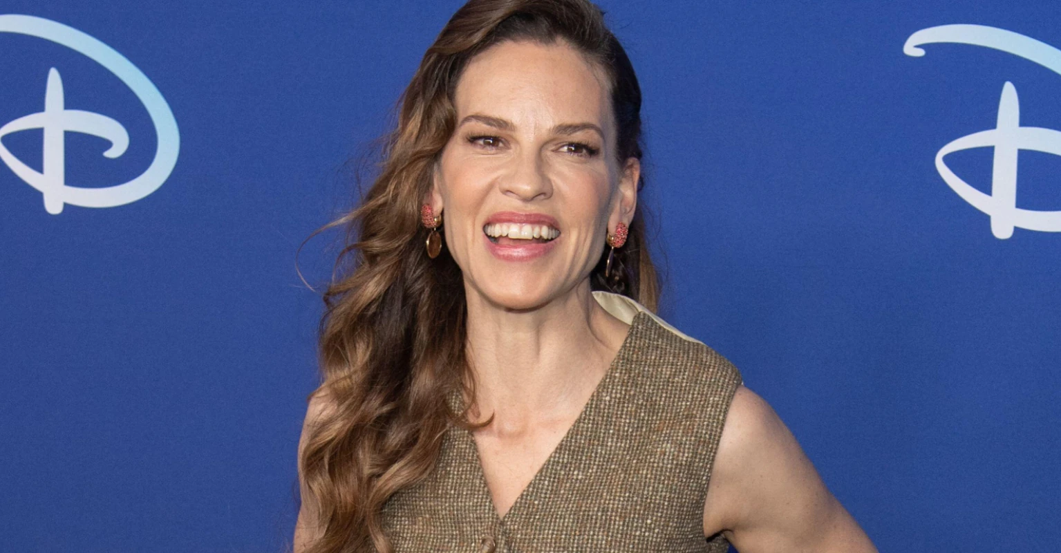Hilary Swank, 48, cradles 'miracle' pregnancy bump in adorable festive snap