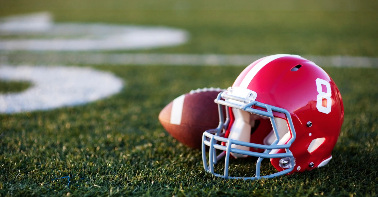 Son speaks out after his mom is criticized for embracing him after football game