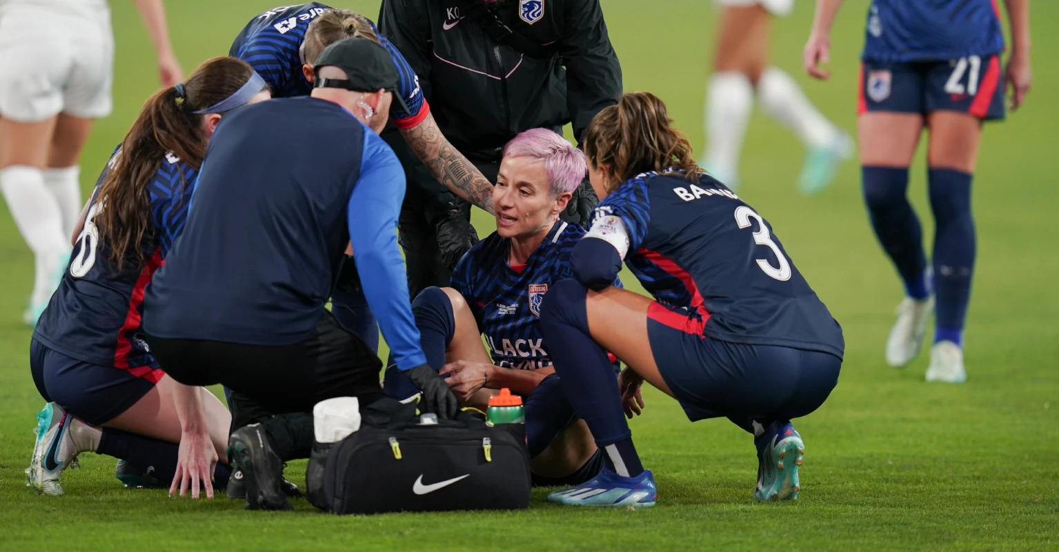 Megan Rapinoe jokes that injury just 3 minutes into her final match is 'proof' God doesn't exist
