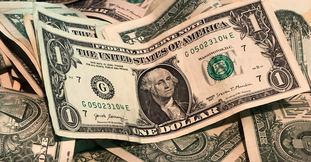 Woman says she was hospitalized after picking up $1 bill from the ground
